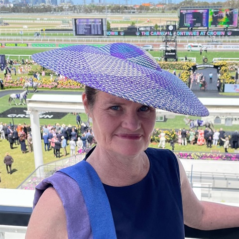 Catherine Storm wearing her millinery on Oaks Day at Flemington Racecourse, Melbourne